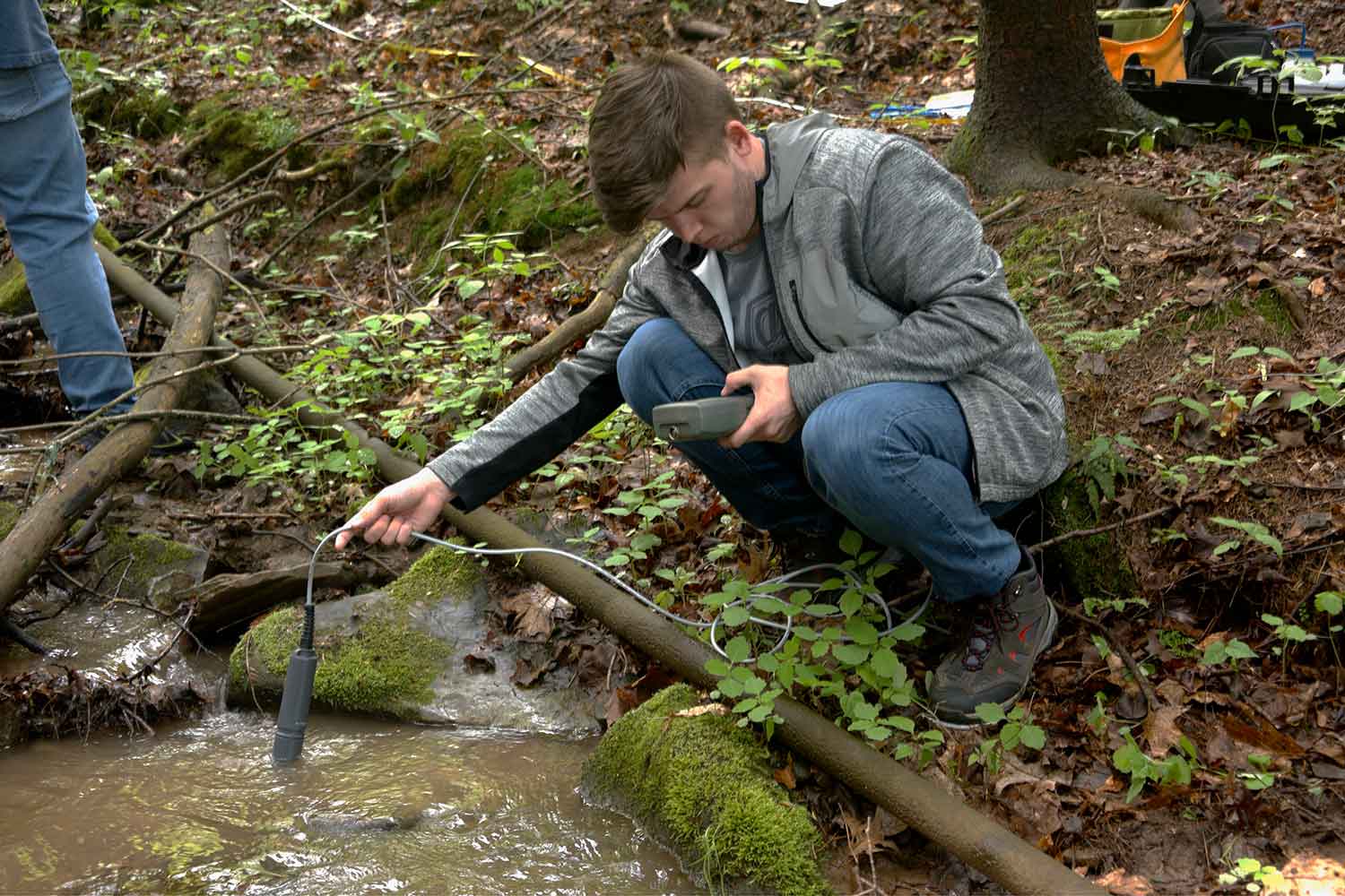 Science student measuring water