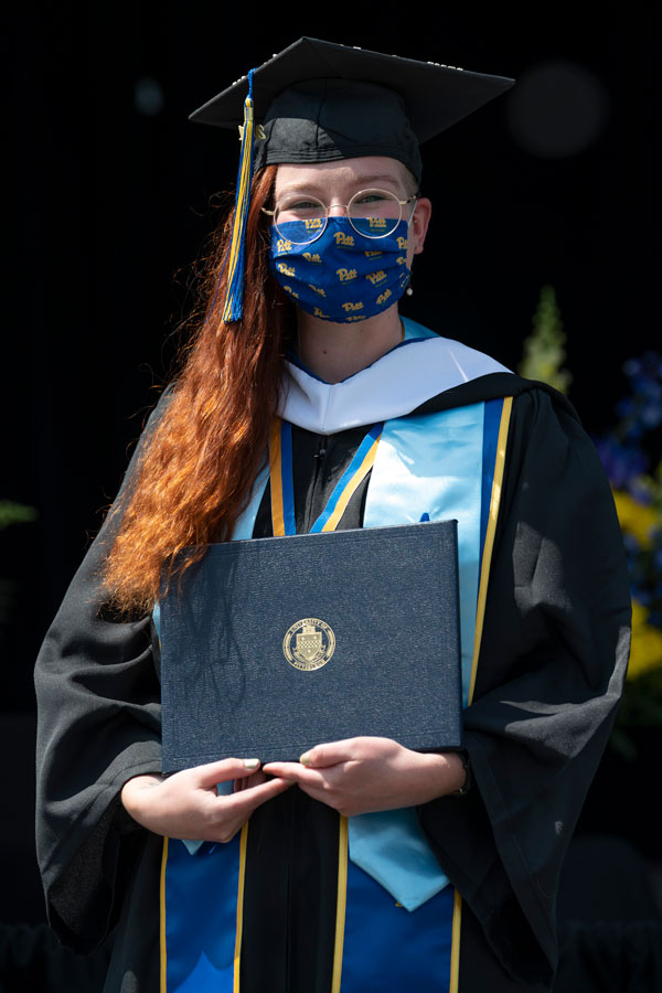Graduate holding degree
