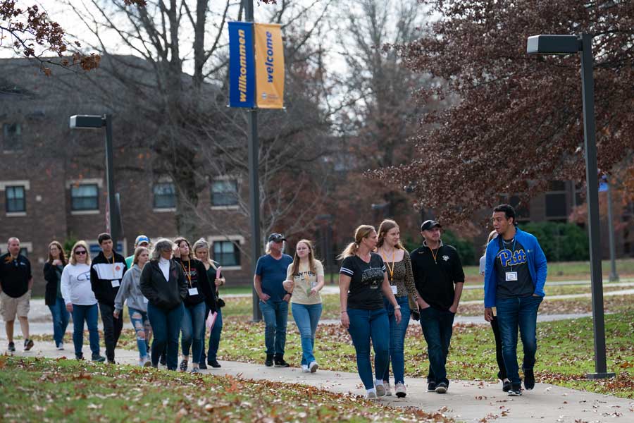 A student taking others on a campus tour