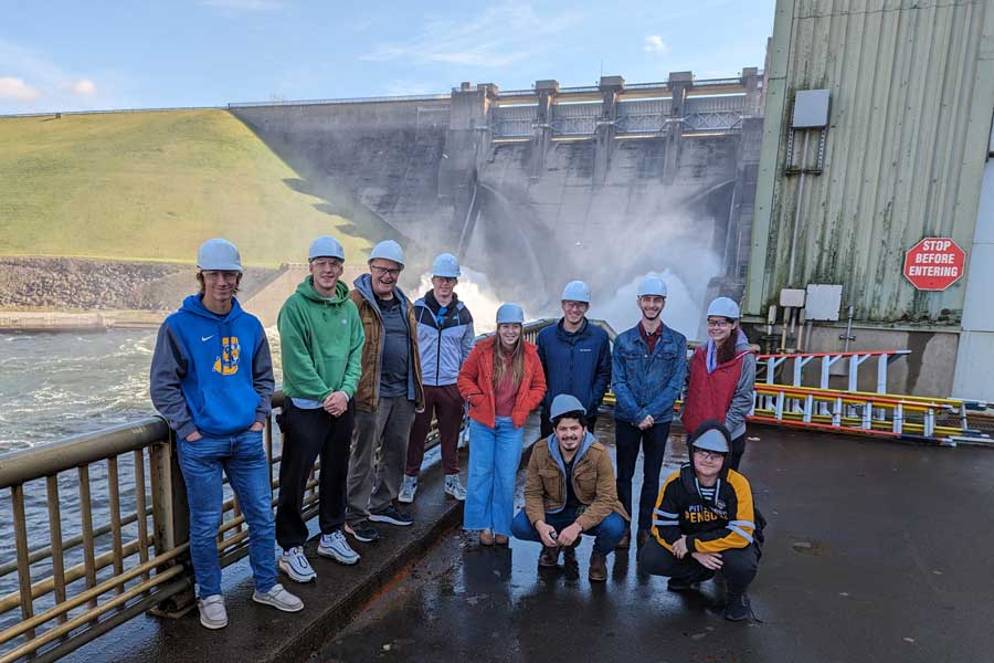 A group of students in front of the Kinzua Dam