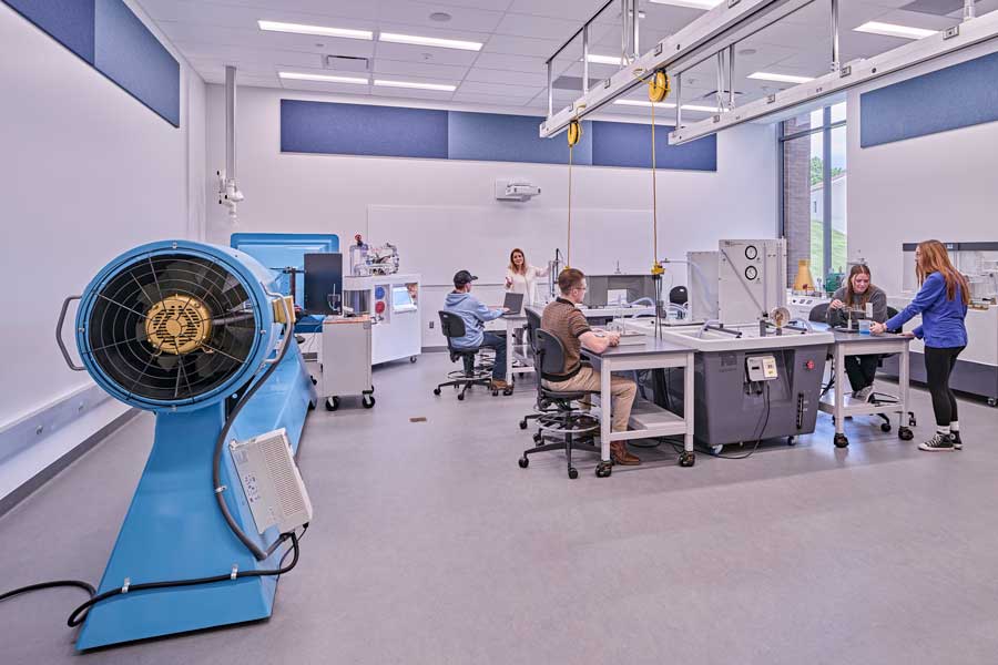 a photo of a lab with students working in it